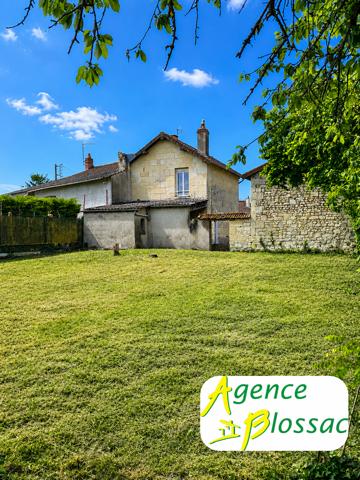 MAISON DE BOURG AVEC TERRAIN ET GARAGE à LOUDUN