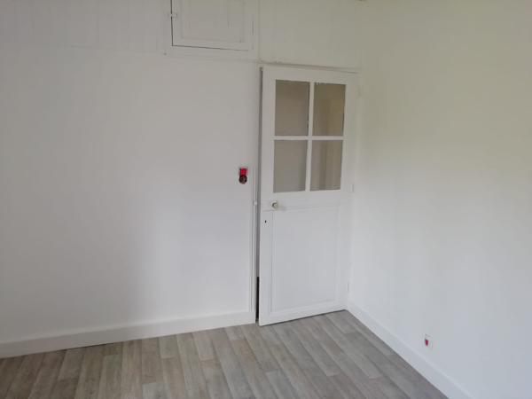MAISON DE BOURG AVEC TERRAIN ET GARAGE à LOUDUN