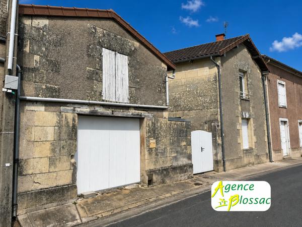 MAISON DE BOURG AVEC TERRAIN ET GARAGE à LOUDUN