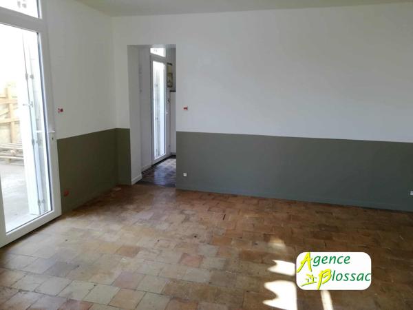 MAISON DE BOURG AVEC TERRAIN ET GARAGE à LOUDUN