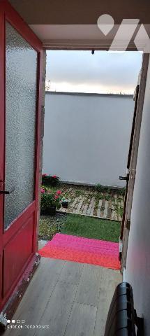 Merville, au sein d'une copropriété entretenue, bel appartement en rez-de-chaussée avec jardine...