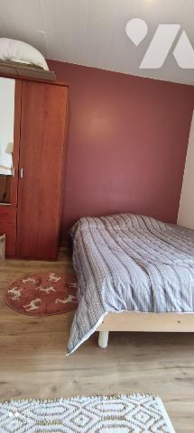 Merville, au sein d'une copropriété entretenue, bel appartement en rez-de-chaussée avec jardine...