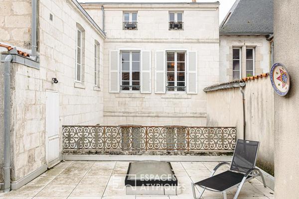 Luminosité et vastes volumes pour cet appartement de charme