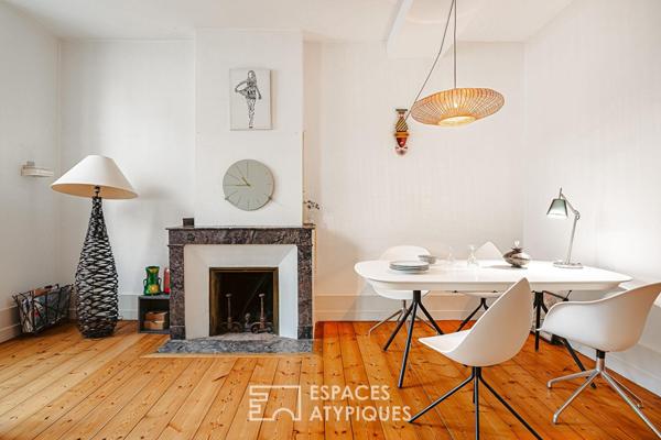 Luminosité et vastes volumes pour cet appartement de charme