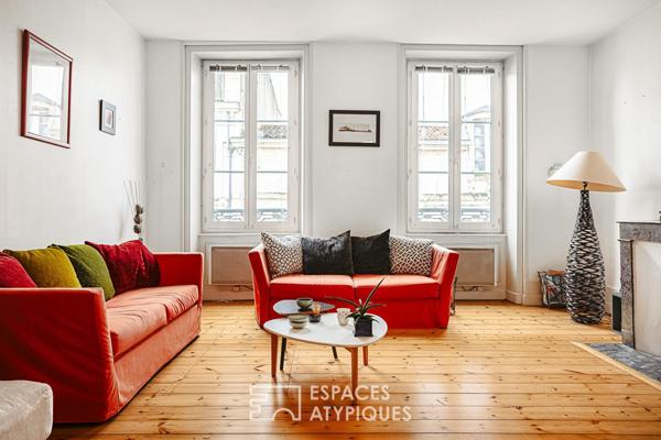 Luminosité et vastes volumes pour cet appartement de charme