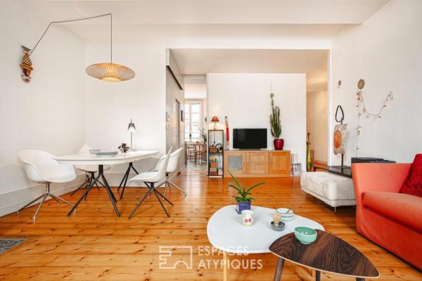 Luminosité et vastes volumes pour cet appartement de charme