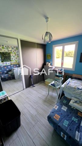 Maison avec vue dégagée, terrain arboré et garage