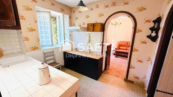 Ensemble immobilier à restaurer, possibilité de faire 4 logements et garages