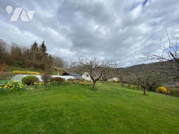 MARMANHAC, sur terrain de 4632 m², maison d'habitation comprenant RDC entrée,  chaufferie/buand...