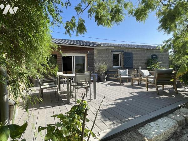 Maison d'habitation avec dépendances d'environ 167 m² habitables sur un terrain de 668 m².