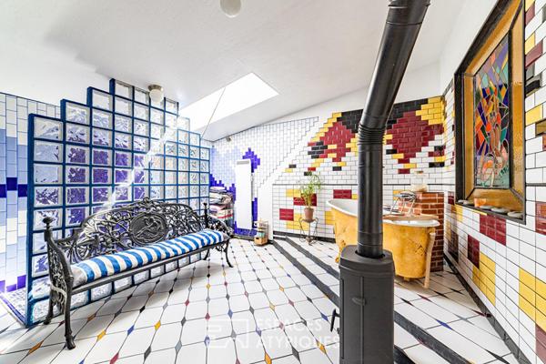 Loft unique au coeur du village de Montigny. Expression pure, volume et lumière !