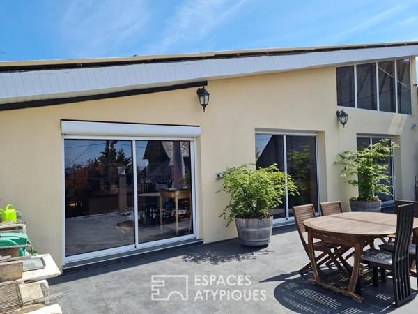 Loft unique au coeur du village de Montigny. Expression pure, volume et lumière !