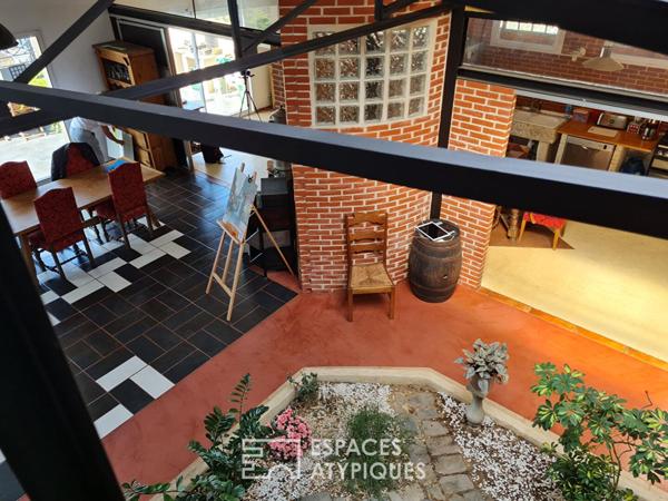 Loft unique au coeur du village de Montigny. Expression pure, volume et lumière !