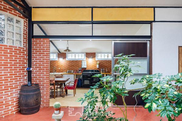 Loft unique au coeur du village de Montigny. Expression pure, volume et lumière !