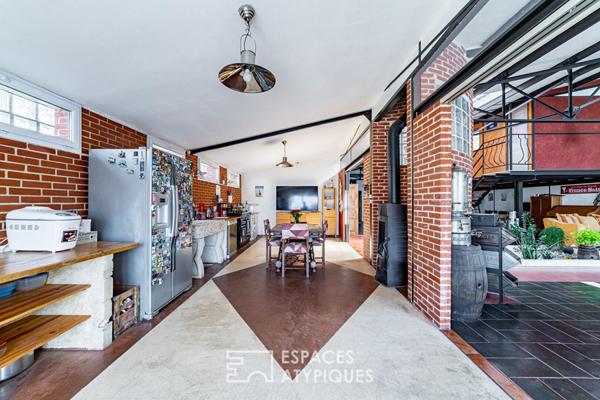 Loft unique au coeur du village de Montigny. Expression pure, volume et lumière !