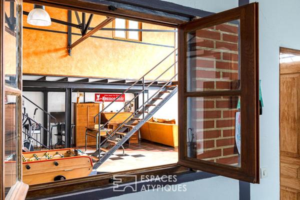 Loft unique au coeur du village de Montigny. Expression pure, volume et lumière !