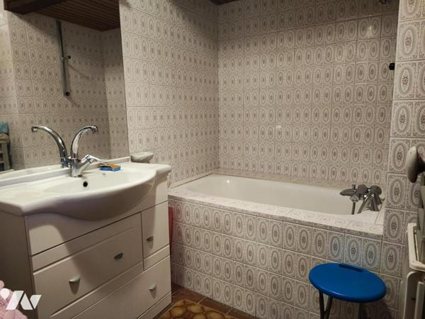 Maison de 90 m² habitable bâtie sur 453 m²