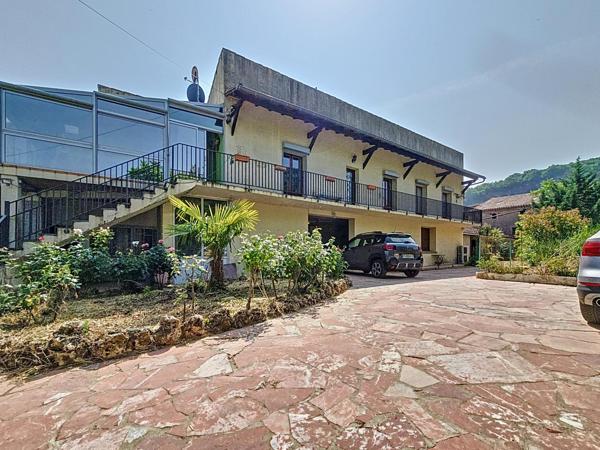 Maison traditionnelle R+1 avec jardin et grand garage – Bédarieux, secteur recherché