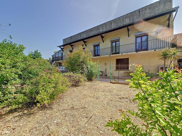 Maison traditionnelle R+1 avec jardin et grand garage – Bédarieux, secteur recherché