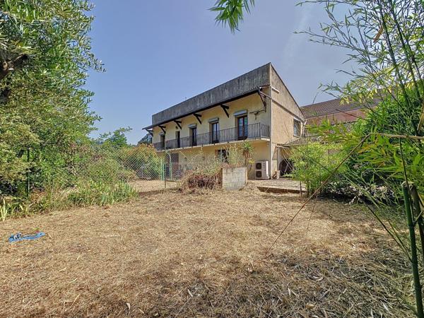 Maison traditionnelle R+1 avec jardin et grand garage – Bédarieux, secteur recherché