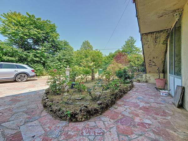 Maison traditionnelle R+1 avec jardin et grand garage – Bédarieux, secteur recherché