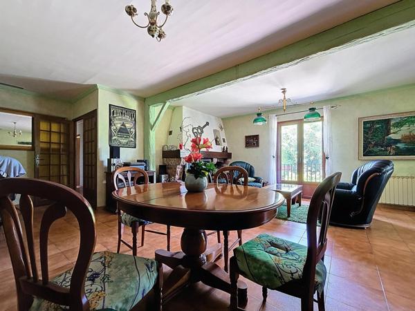 Maison traditionnelle R+1 avec jardin et grand garage – Bédarieux, secteur recherché