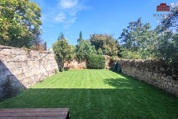 VENDU LIBRE - Appartement avec jardin