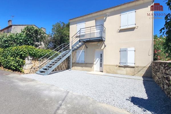VENDU LIBRE - Appartement avec jardin