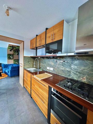 Appartement T2 transformable en T3 avec terrasse, cave et garage à COGNIN