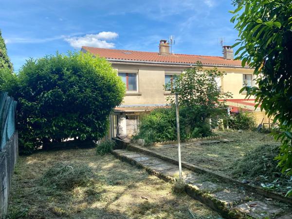 maison avec garage et jardin attenant