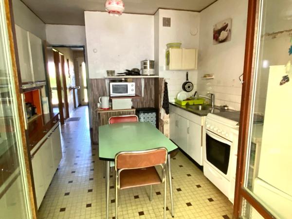 maison avec garage et jardin attenant