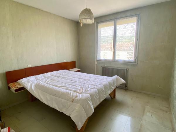 maison avec garage et jardin attenant