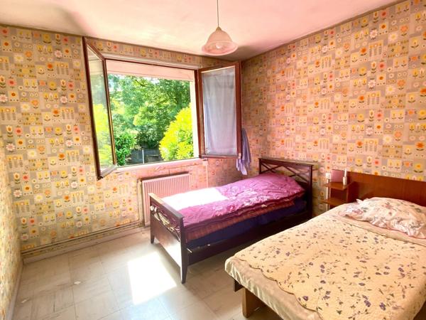 maison avec garage et jardin attenant