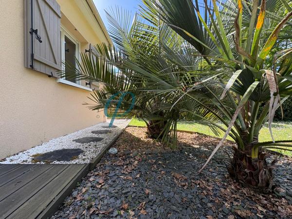 Maison familiale spacieuse de 205m² avec jardin arboré, sans vis-à-vis, proche de Nantes.