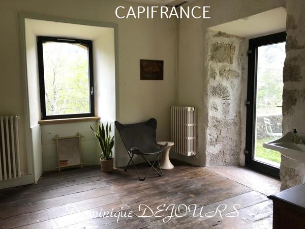 Grande maison bourgeoise de 400m² habitable et son parc de 8000m²au bord de la rivière