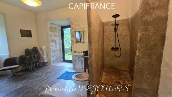 Grande maison bourgeoise de 400m² habitable et son parc de 8000m²au bord de la rivière
