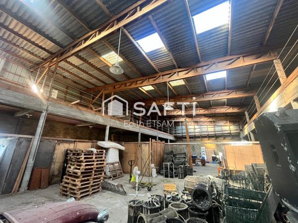 Hangar de 600 m² sur terrain constructible proche de la mer