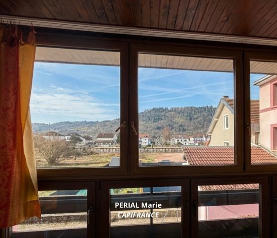 Appartement 3 pièces avec véranda, garage et cheminée – Rupt-sur-Moselle (88360)