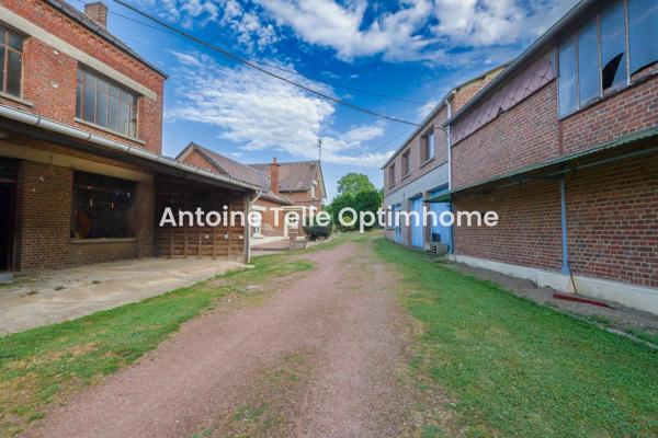 Proche Le Cateau 59360 - Maison individuelle avec nombreuses dépendances & jardin sur 1700m²