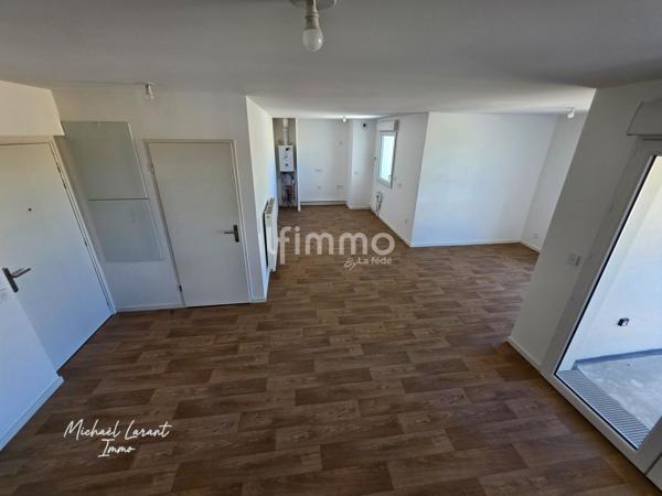 Duplex T3 -2 places de parking-Balcon