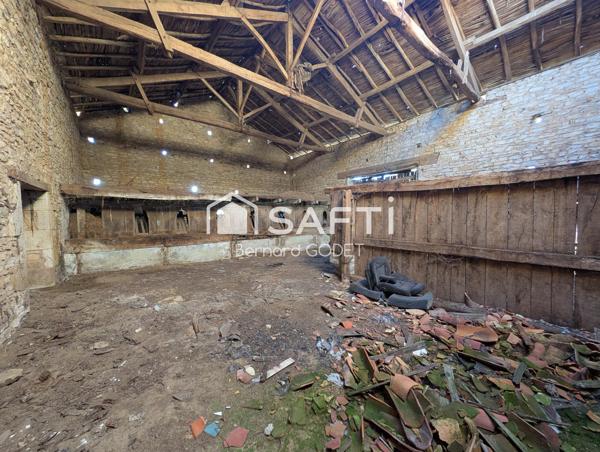 grange avec dépendance terrain d'environ 13053M²