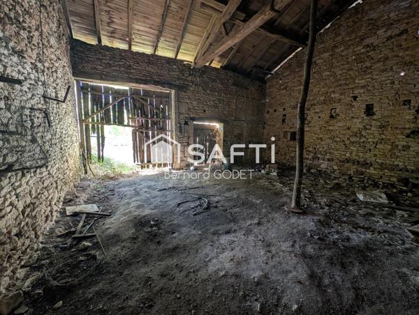 grange avec dépendance terrain d'environ 13053M²