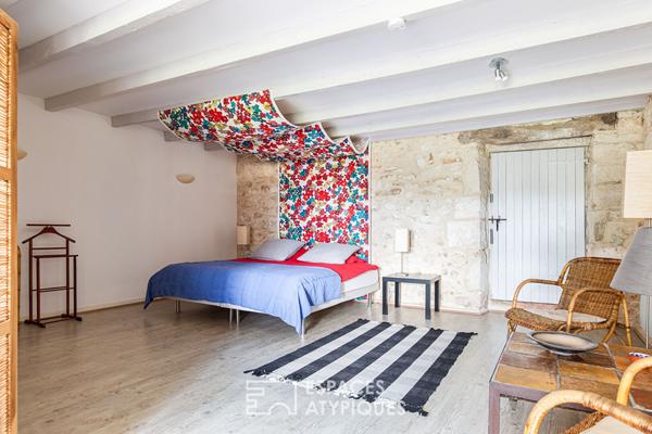 Bâtisse de caractère avec salle de réception et gîtes au coeur des vignes