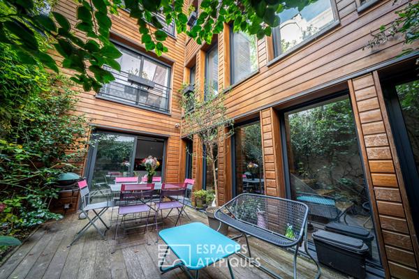 Maison contemporaine avec terrasse arborée