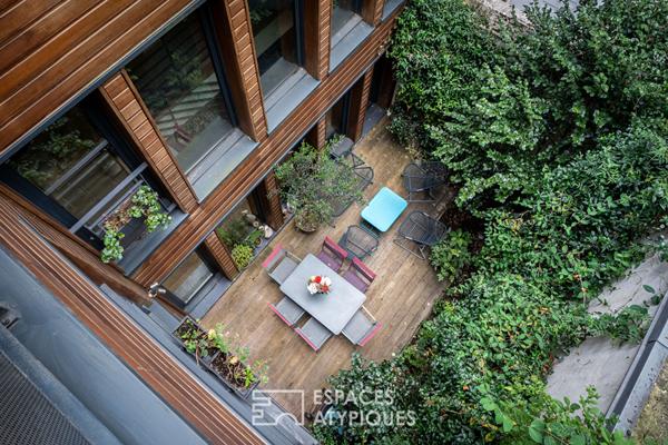 Maison contemporaine avec terrasse arborée
