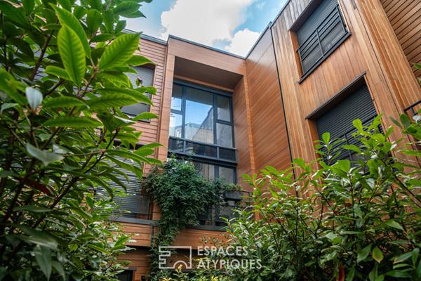 Maison contemporaine avec terrasse arborée