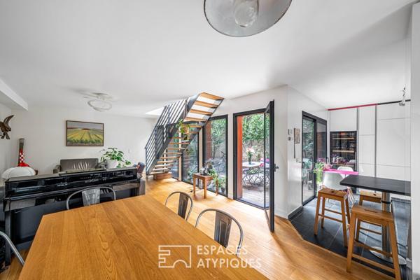 Maison contemporaine avec terrasse arborée