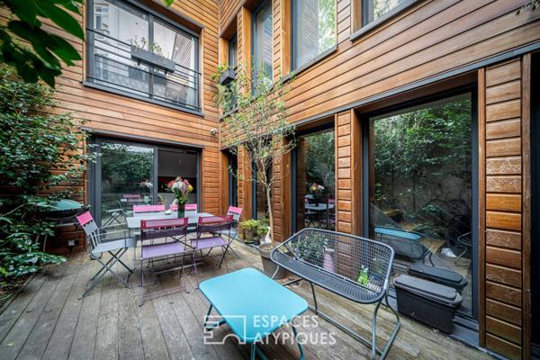 Maison contemporaine avec terrasse arborée