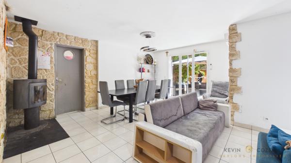 Maison familiale de 100 m² avec double garage, jardin