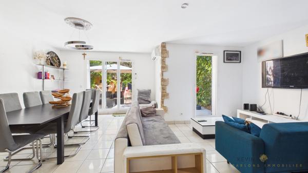 Maison familiale de 100 m² avec double garage, jardin